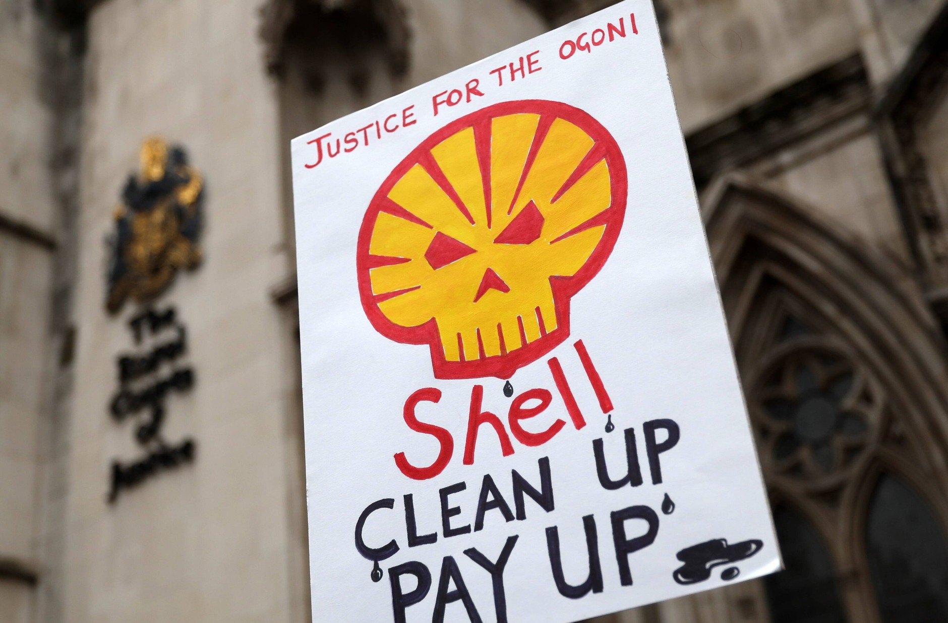 Picture of the poster with the inscription "Shell, clean up, settle accounts" Made during the protest 