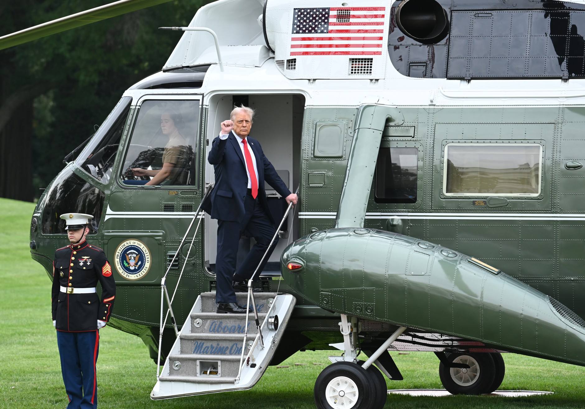 US President Donald Trump speaks to journalists before boarding Marine One, September 16, 2025.