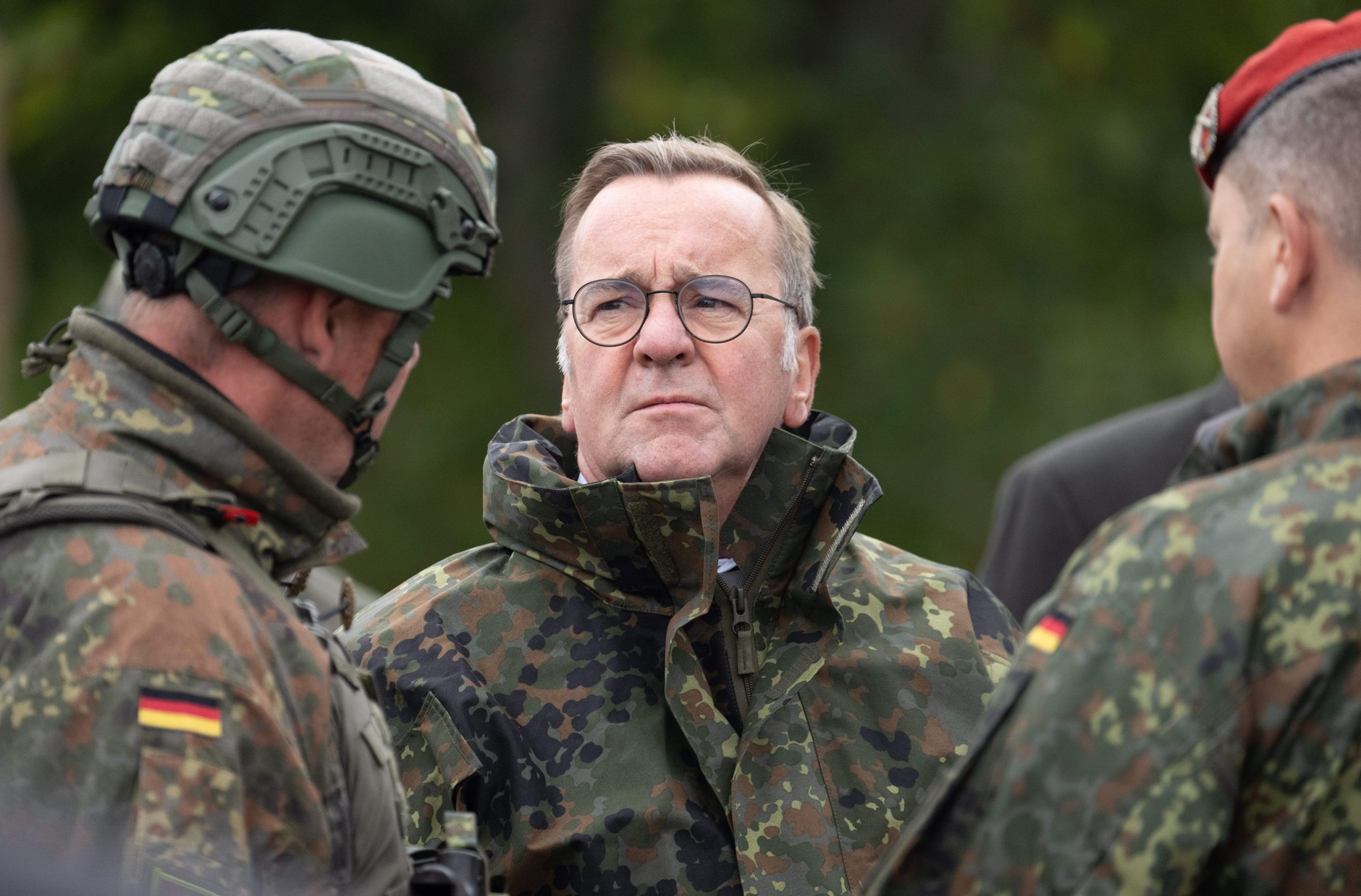 The German defense minister Boris Pistorius talks to soldiers during a visit to the Bundeswehr artillery school at Idar-Oberstein, September 16, 2024.