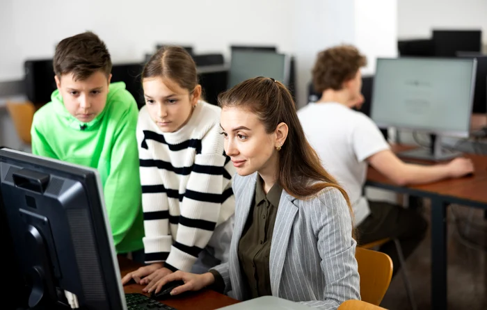 Children, computer lab, teacher