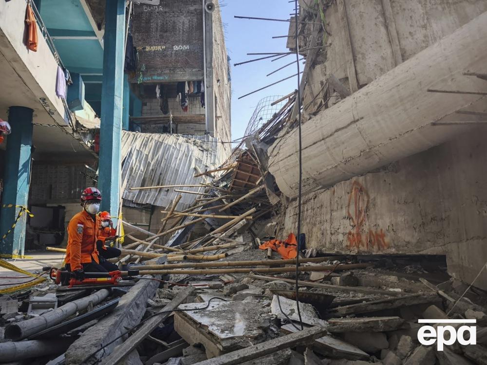 In Indonesia, due to illegal completion, a school fell, at least 60 dead. Photo 3
