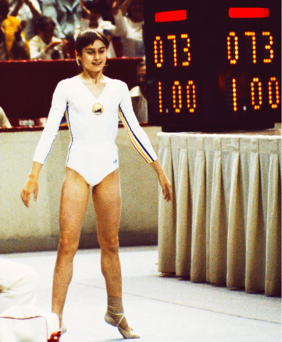 Nadia Comăneci and that 1.00, photo: Guliver/Gettyimages Nadia Comăneci with Sabrina Voinea before leaving for the World Championships in Indonesia