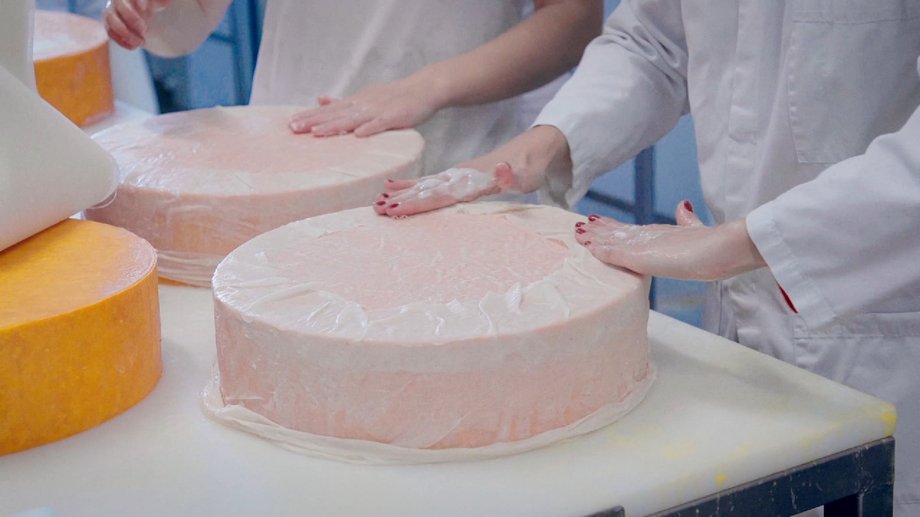 The lard protects the iconic Red Leicester cheese