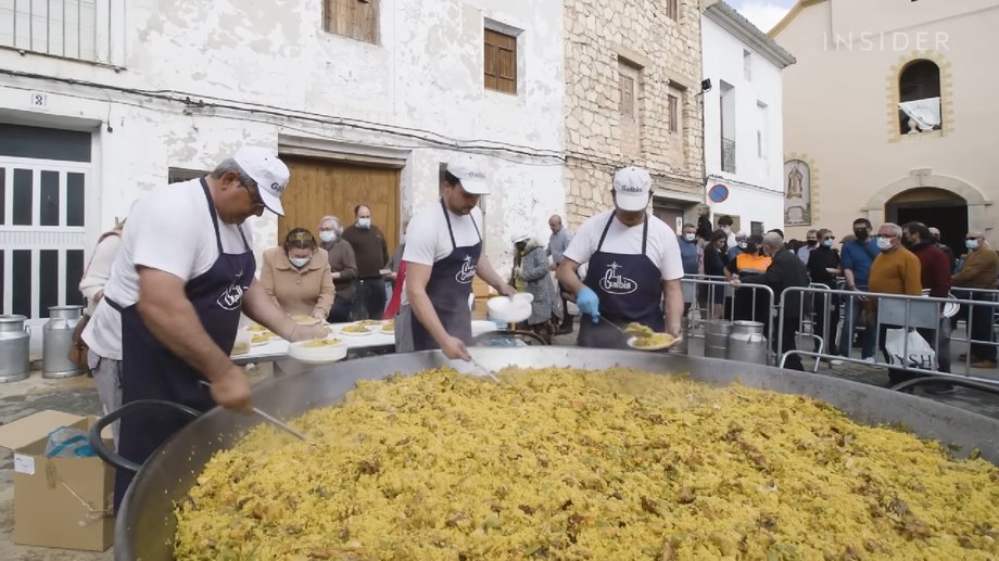 They cook a giant paella to honor their ancestors. The Spanish tradition has existed since the 17th century