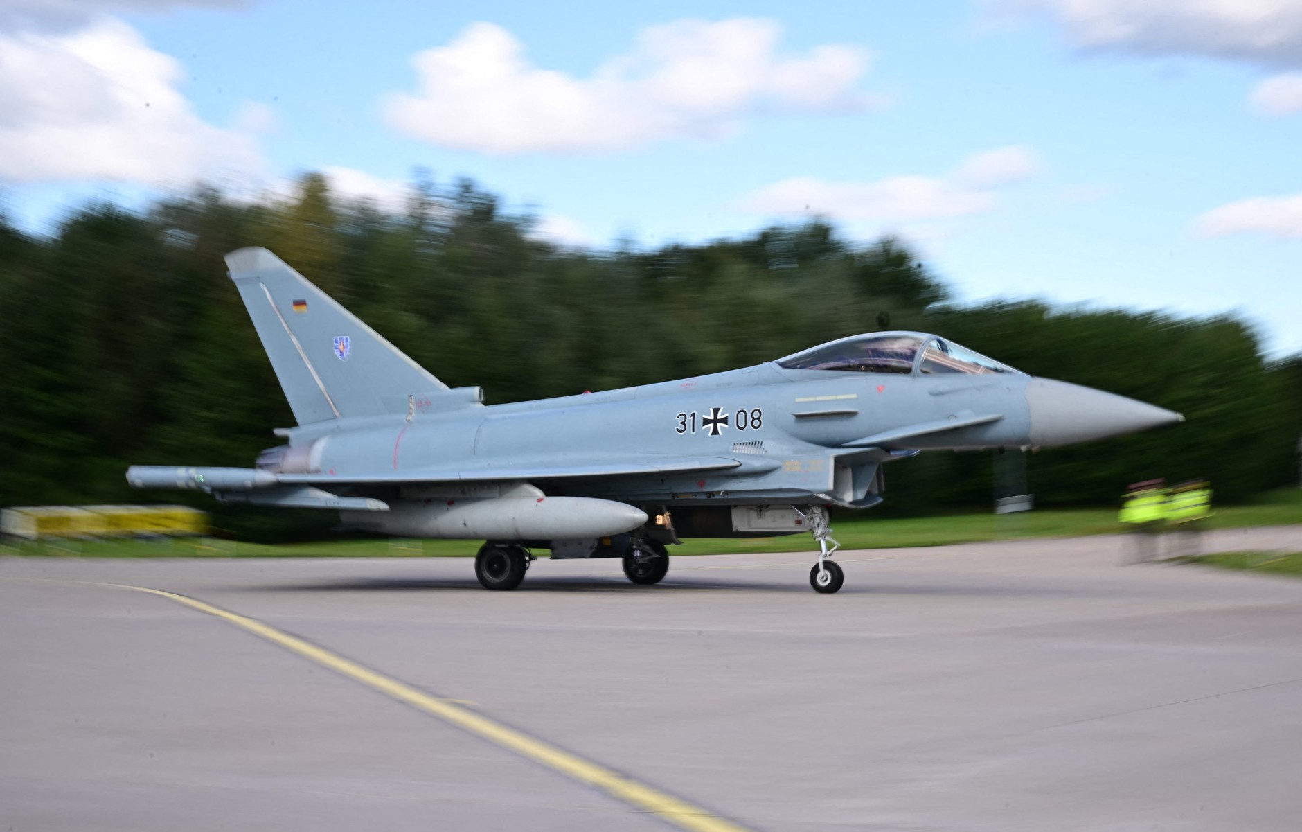 A German Air Force Eurofighter Typhoon lands at a military base in Laage, September 23, 2025.