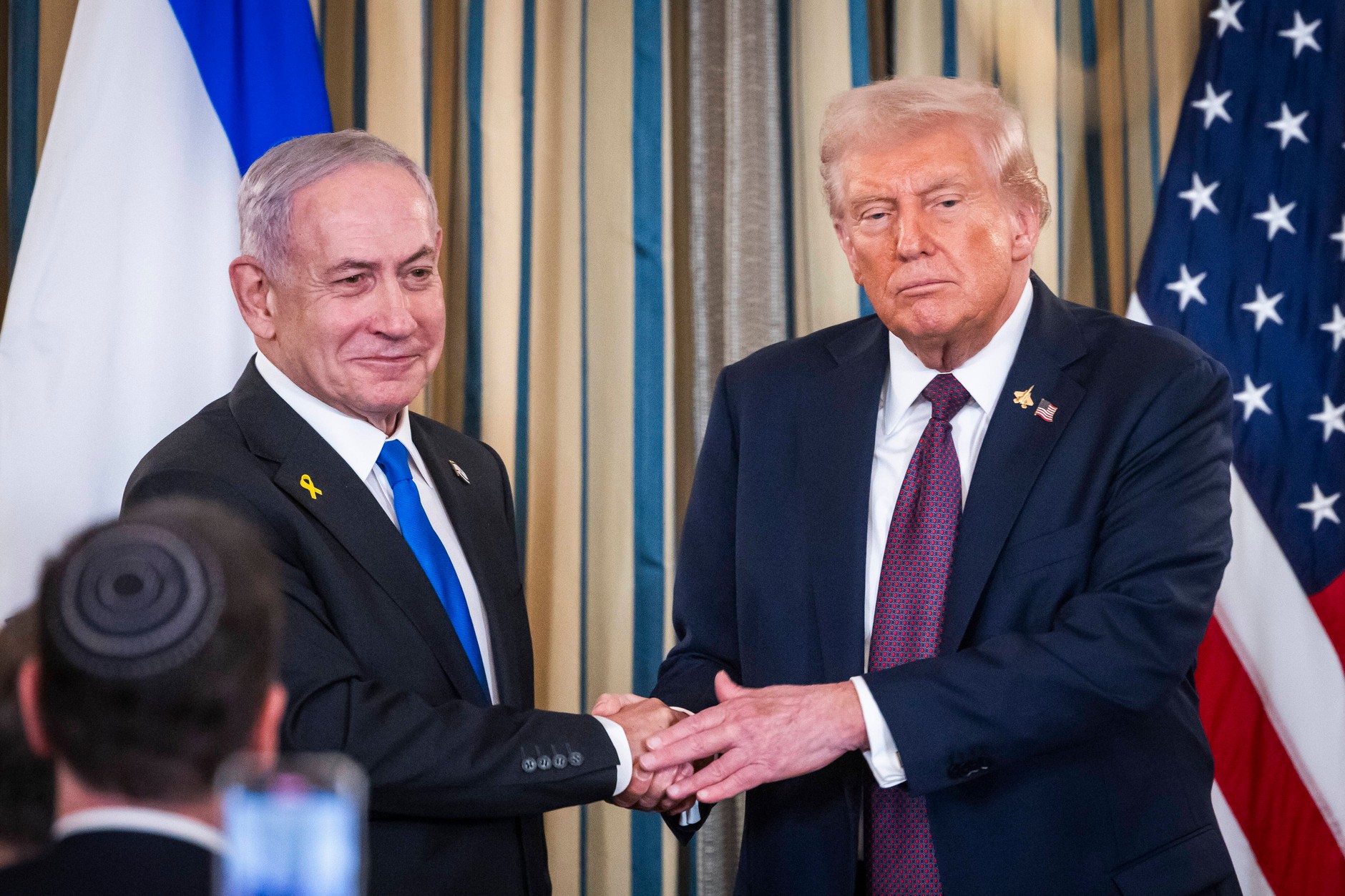 US President Donald Trump and Israeli Prime Minister Binyamin Netanyahu after a press conference at the White House in Washington, September 29, 2025.