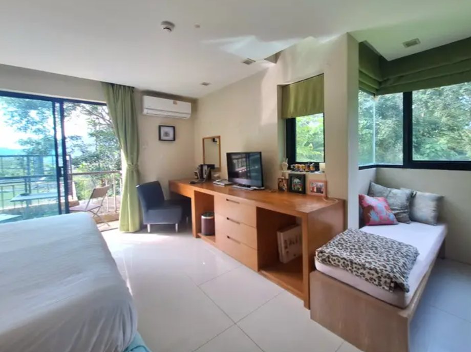 The serviced apartment offers access to amenities such as a swimming pool and gym