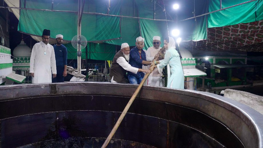 The cauldron is over 11m wide and 4.5m deep, so it takes at least four volunteers to maneuver the large oar