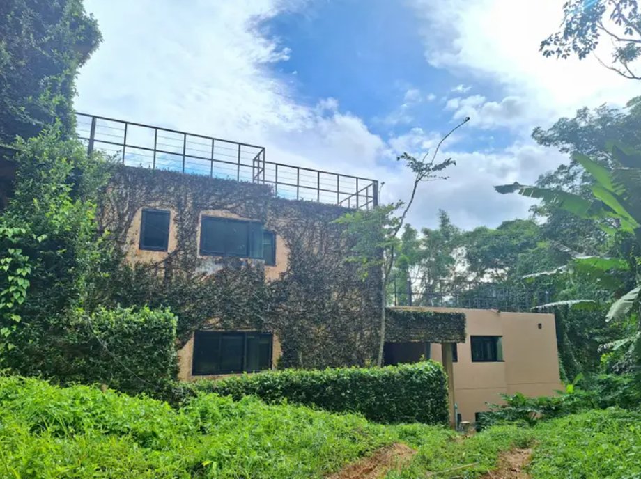 His serviced apartment is located in a mid-range hotel in Kathu, a suburban district of Phuket