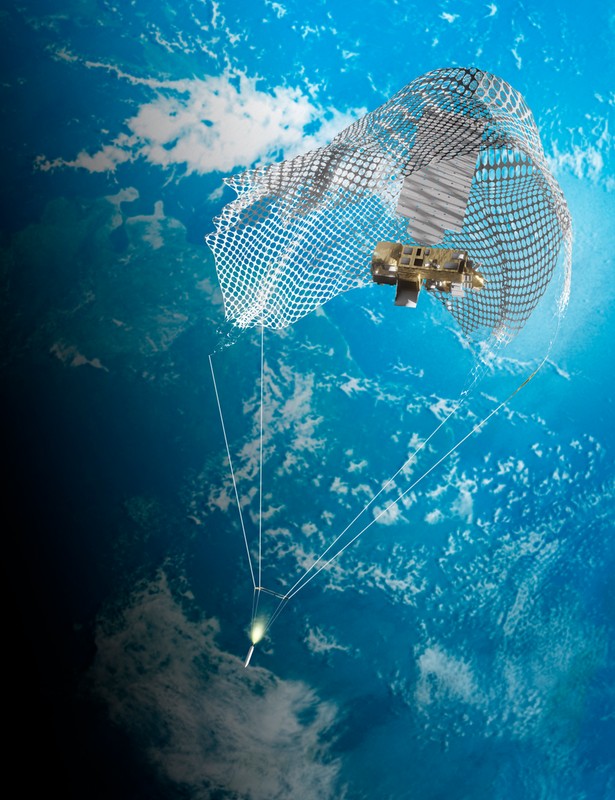 Graphics depicting an unmanned spacecraft that uses the attached mesh to catch and remove cosmic garbage from the Earth's orbit