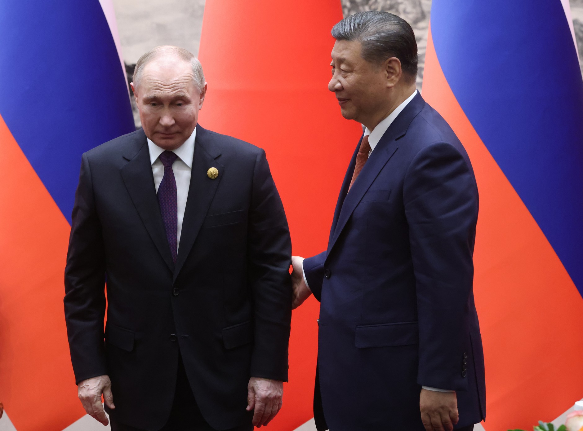 President of Russia Vladimir Putin and President of the People's Republic of China Xi Jinping