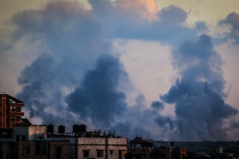 Israeli attacks in Gaza in first major test of new truce. Gaza officials report dozens of deaths / IDF claims it was retaliation for attacks on its troops
