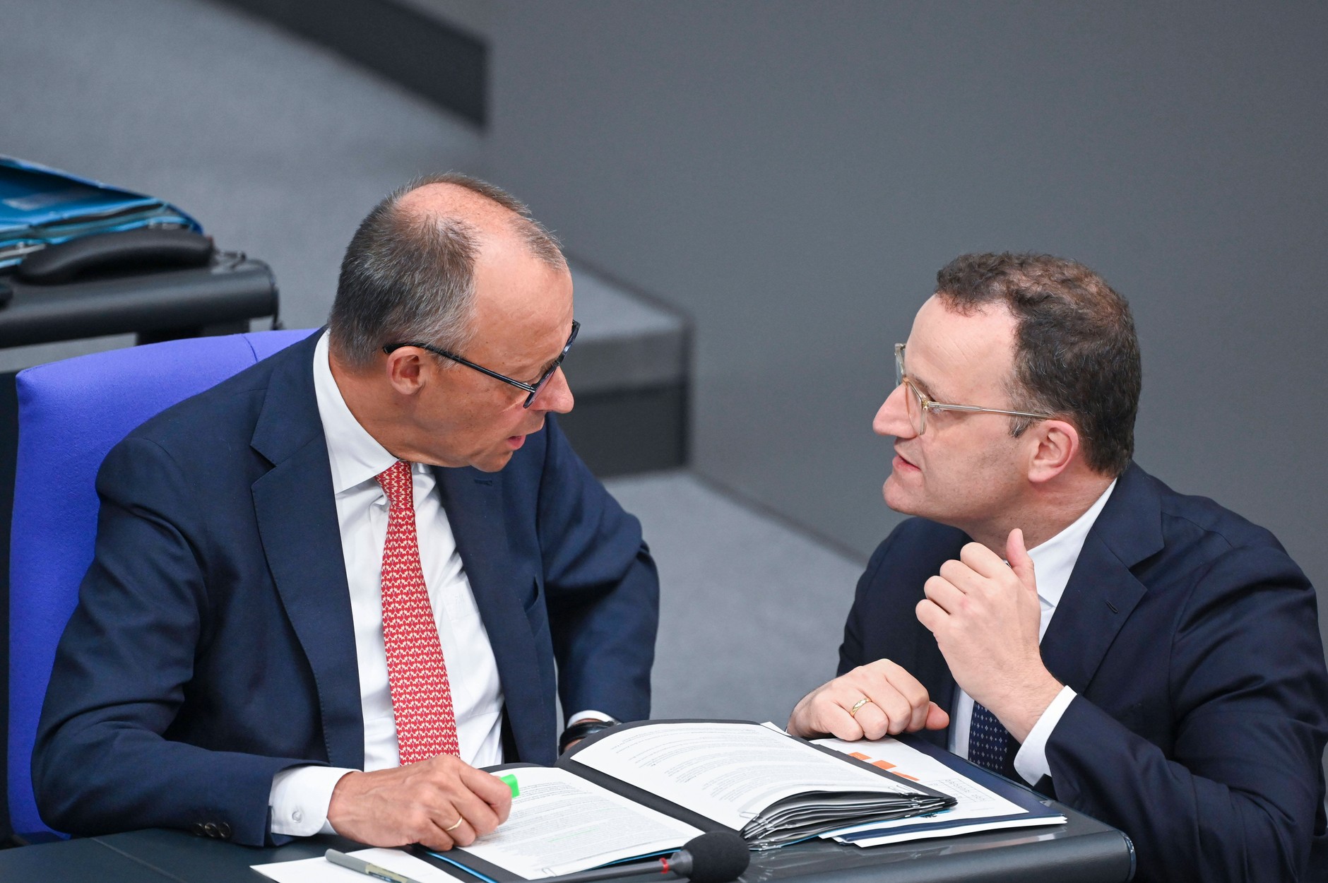 Friedrich Merz, Chancellor of Germany, talks to Jens Spahn, leader of the CDU/CSU faction in the Bundestag. Berlin, July 9, 2025