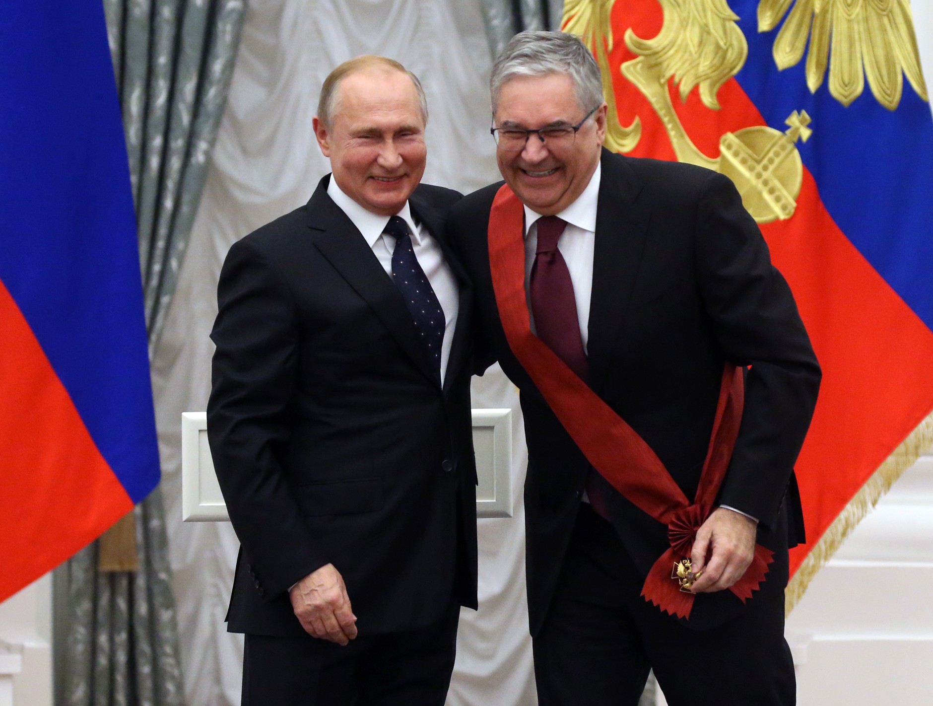 Russian President Vladimir Putin and the head of state television and radio station Oleg Dobrodeev in Moscow, November 21, 2019.