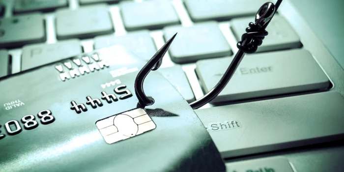 A hook caught a bank card placed on a keyboard