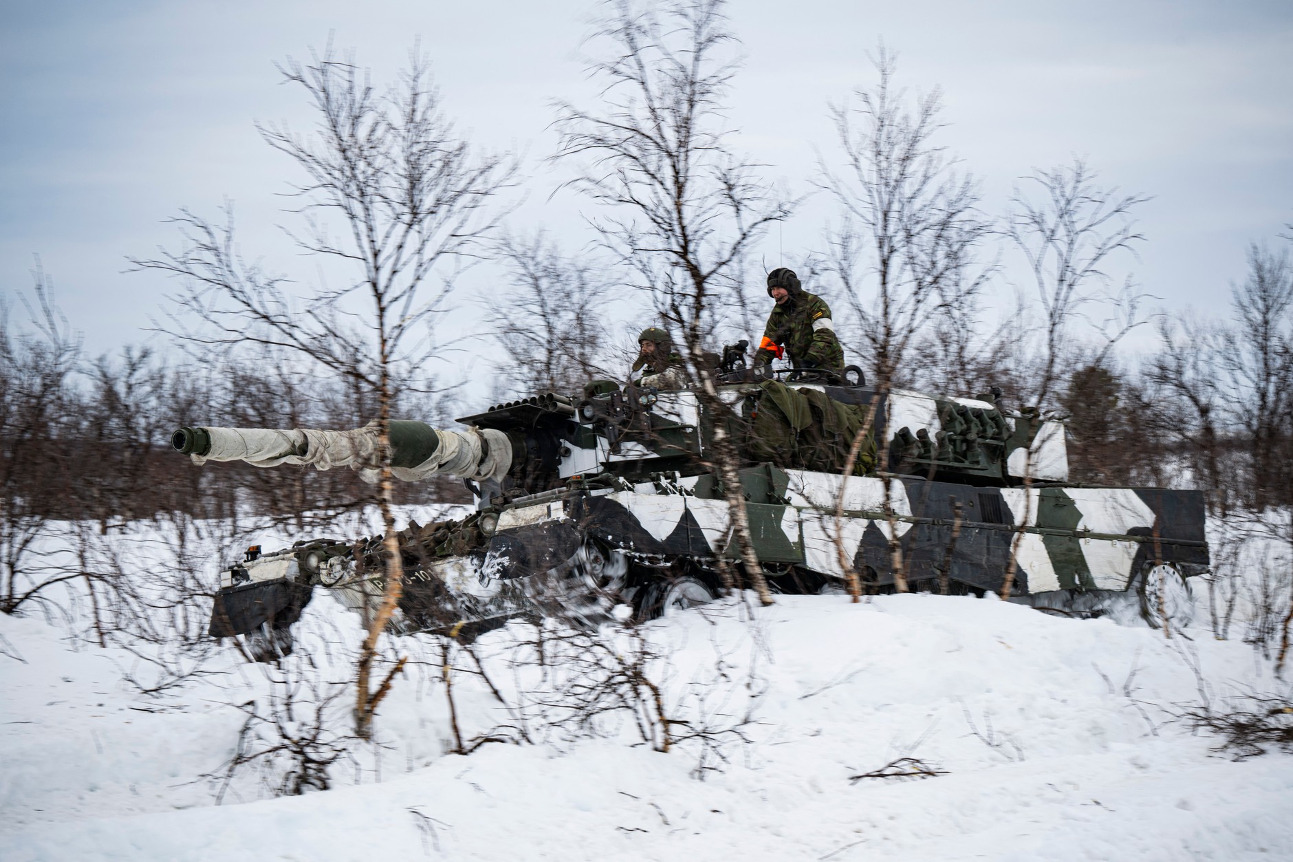 Soldiers from Finland and Sweden train together during NATO exercises. Kivilompolo, Norway, March 9, 2024