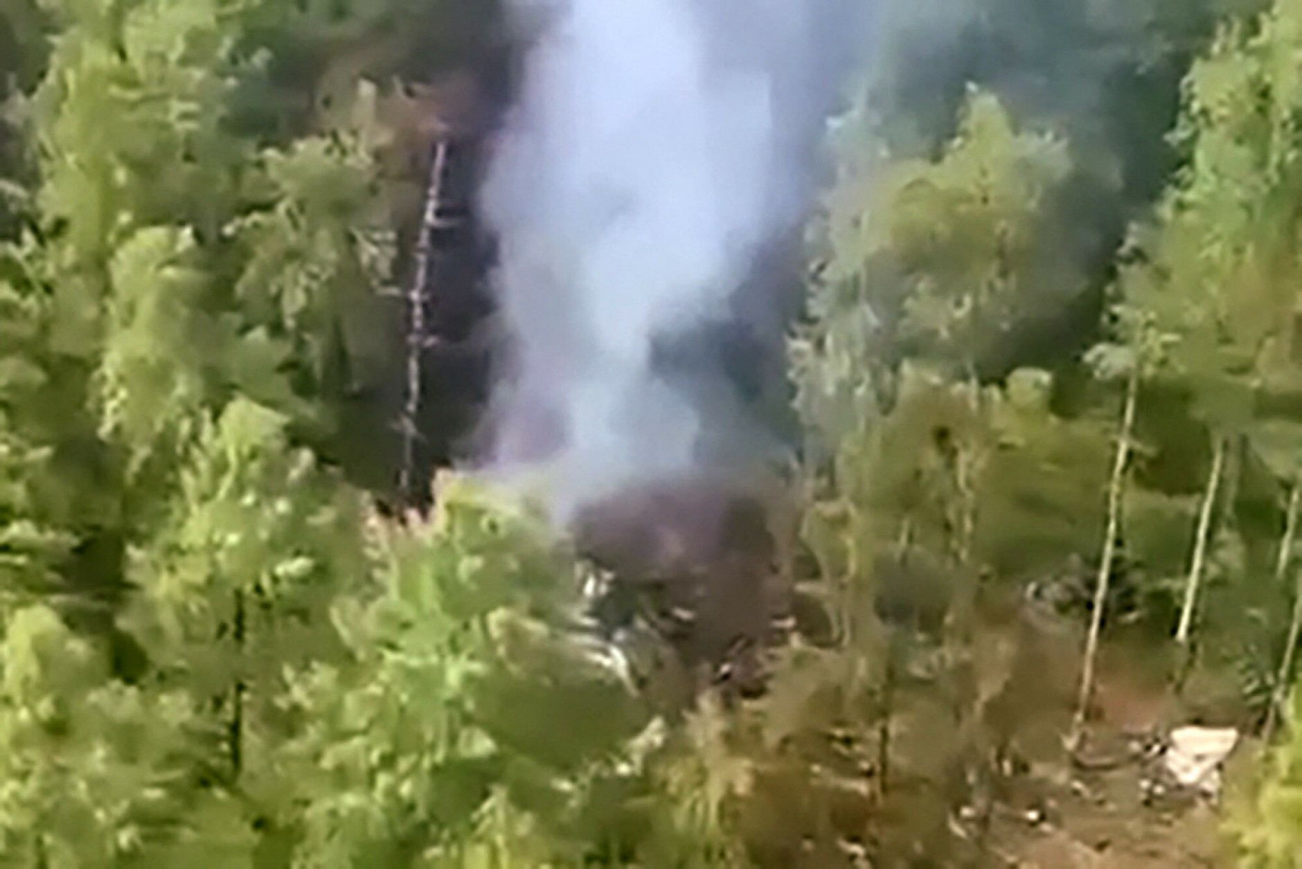 The site of the Antonov An-24 plane crash near Tynda, Russia