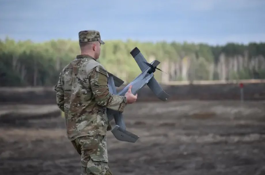 A US soldier holding a Surveyor interceptor