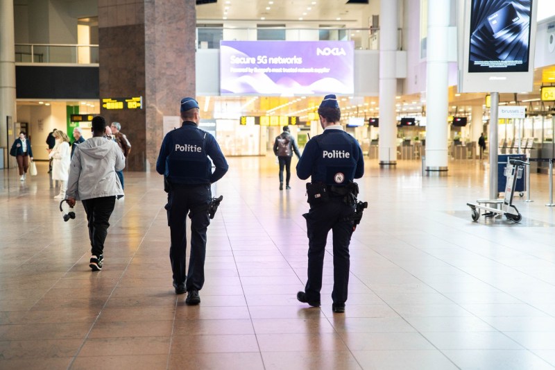 Four police officers in Brussels, the target of a man who wanted to drive into them. The car also hit a police vehicle