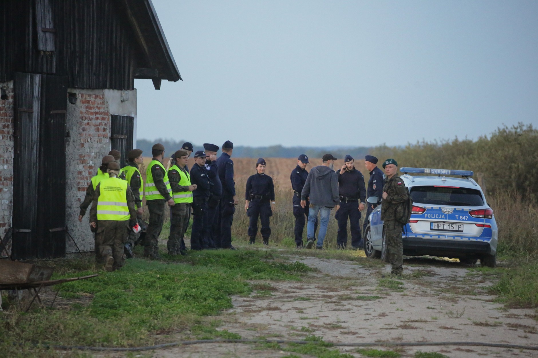 Services at the site where a Russian drone was found in Korsze, Poland, September 20, 2025.