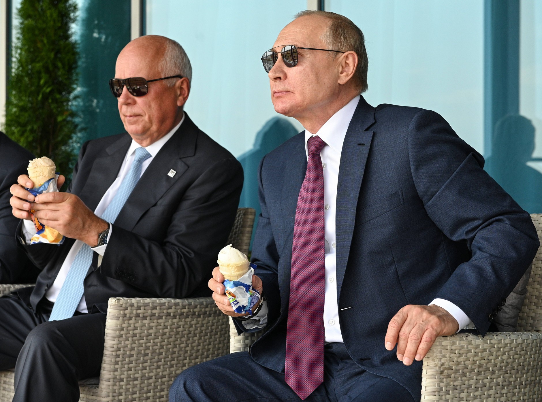 Russian President Vladimir Putin (right) and Rostec CEO Sergei Chemezov (left) watch demonstration flights during the MAKS 2021 International Aerospace Salon. Outside Moscow, Russia, July 20, 2021.