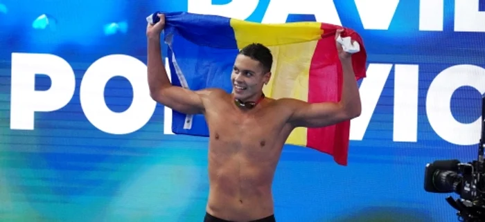 David Popovici, accompanied by the flag at the big competitions