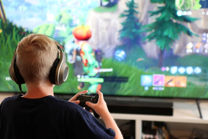 child playing on the console