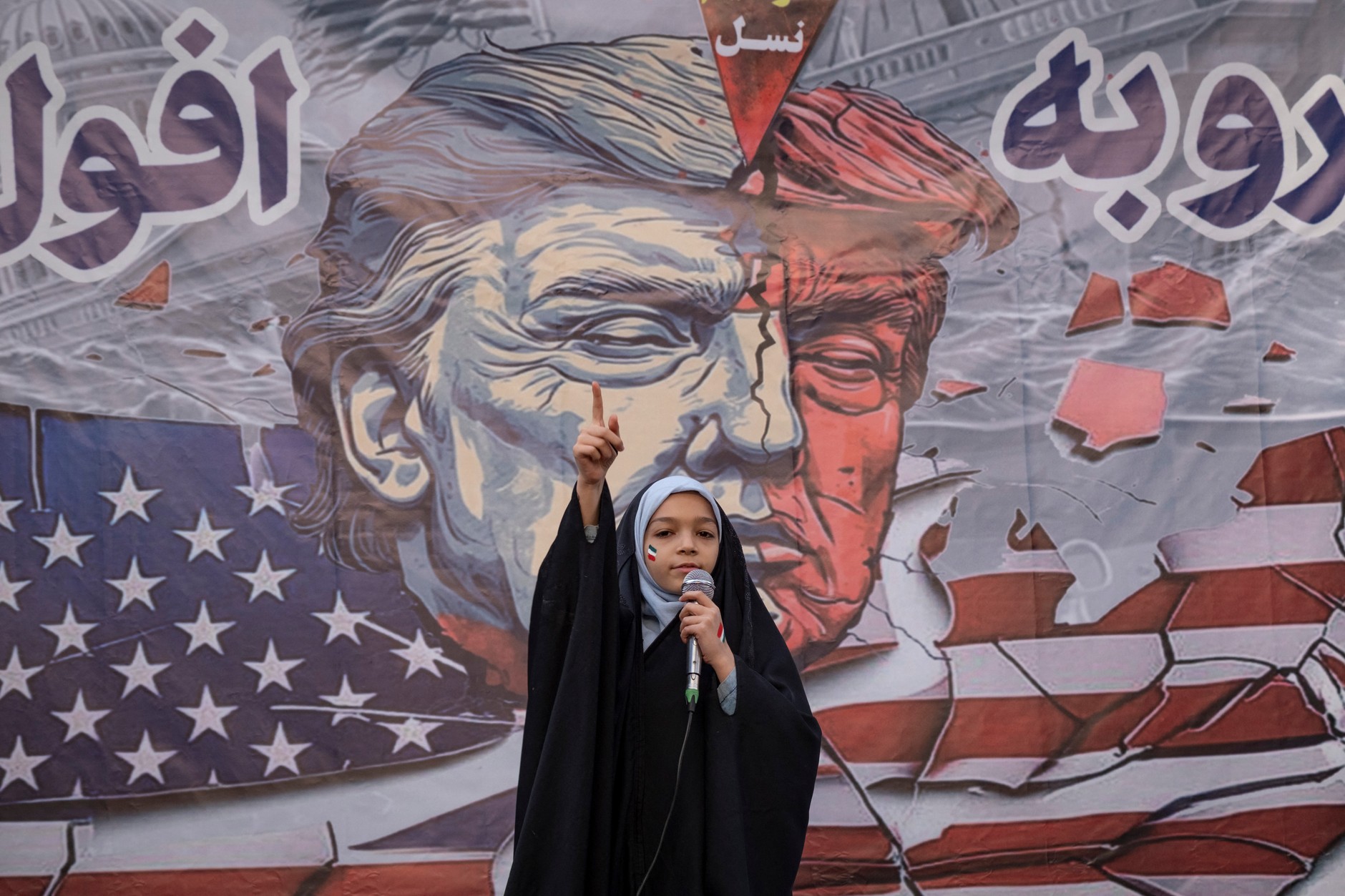 An Iranian student during an anti-American and anti-Israel demonstration. Tehran, November 4, 2025