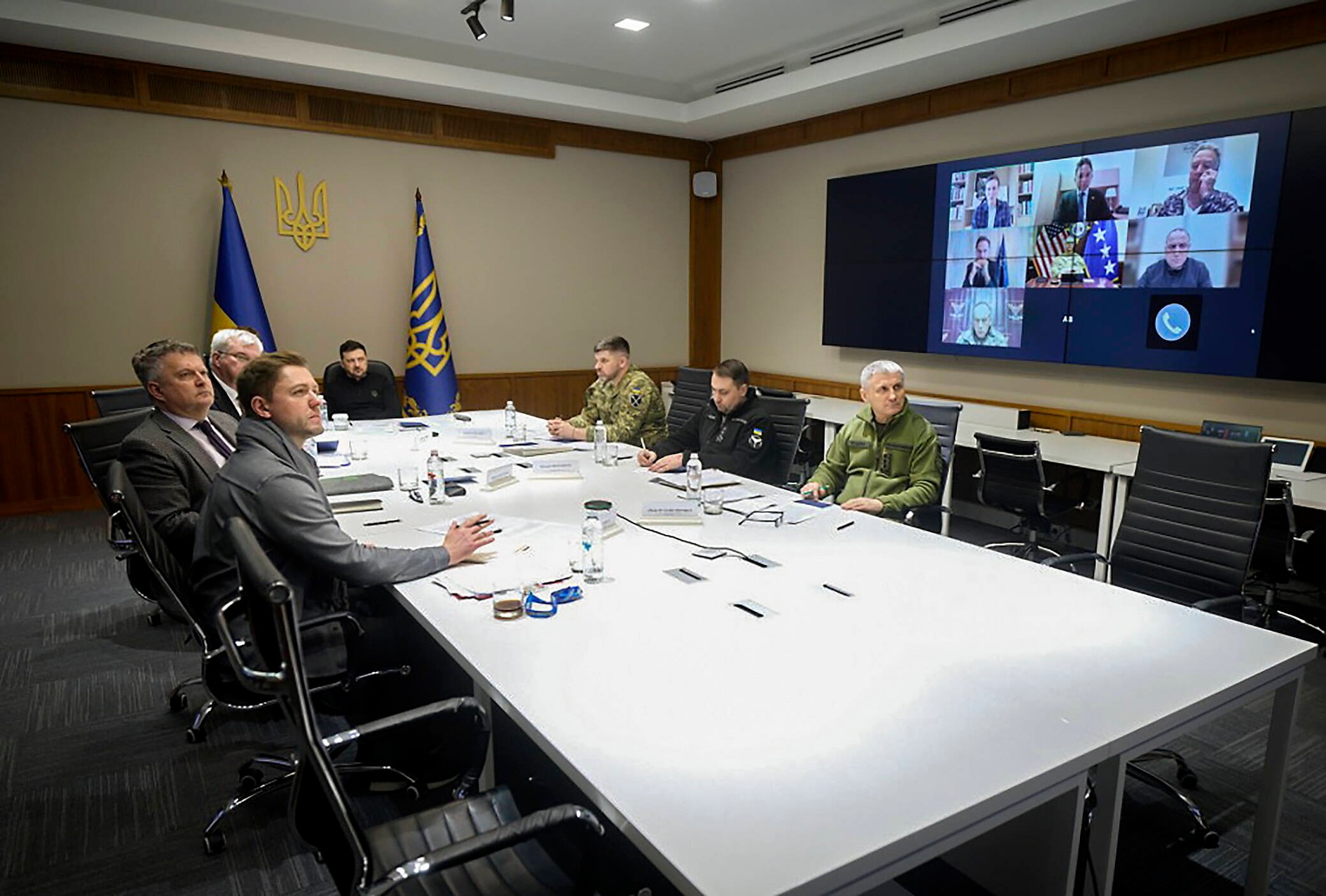 Ukrainian President Volodymyr Zelensky (center) with members of his team during a video conference with US officials on one of the three key peace documents, Kiev, Ukraine, December 11, 2025.