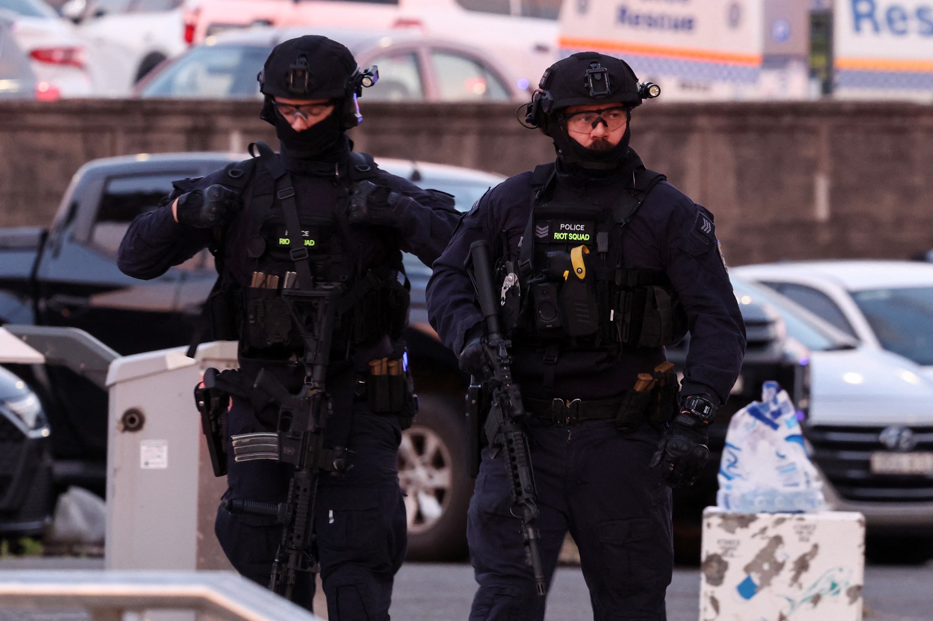 Armed police officers after a shooting on Bondi Beach in Sydney, December 14, 2025.