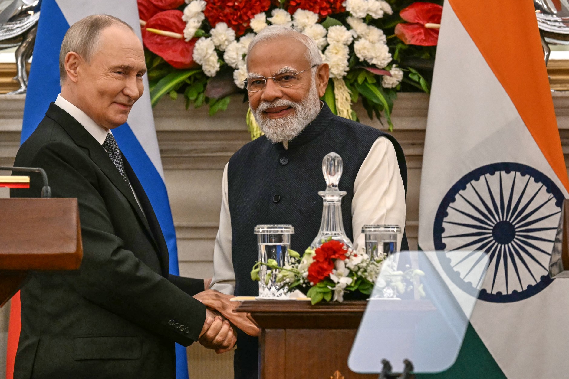 Russian President Vladimir Putin talks with Indian Prime Minister Narendra Modi in New Delhi, December 5, 2025.