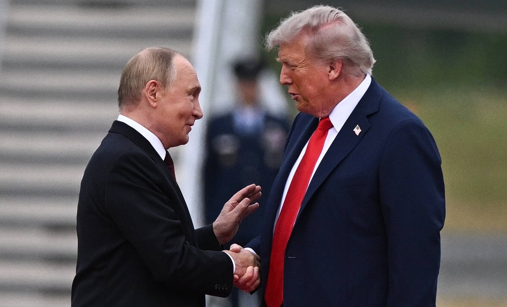 U.S. President Donald Trump greets Russian President Vladimir Putin during a meeting in Anchorage, Alaska, August 15, 2025.