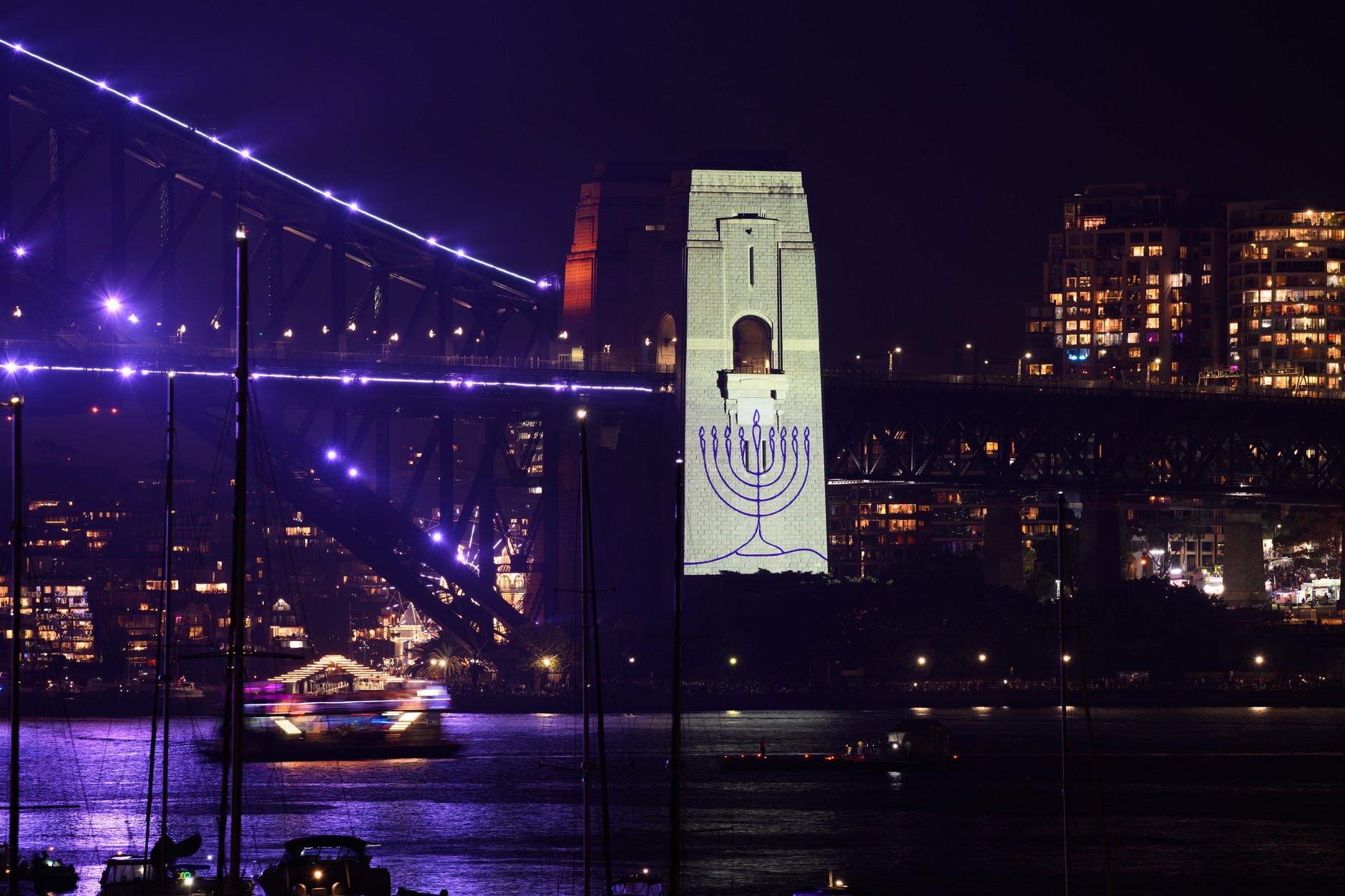The Sydney Harbor Bridge was illuminated in white and a menorah appeared on its pylons as a symbol of Judaism