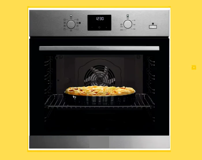 Modern built-in oven with cake inside, illustration for the best eMAG ovens