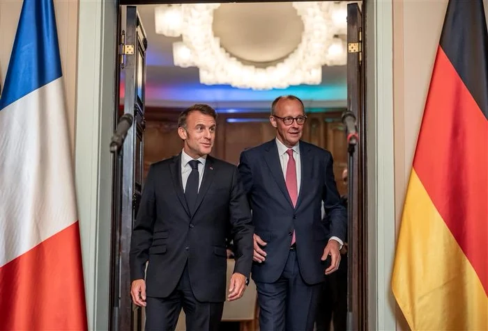 Emmanuel Macron and Friedrich Merz/PHOTO:X