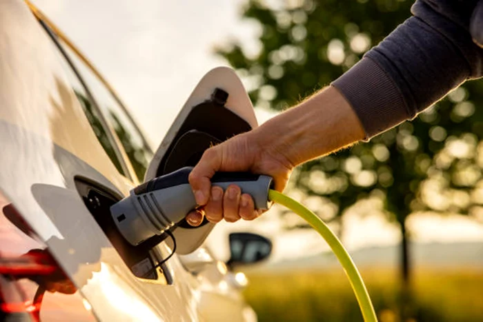 Someone is charging an electric car