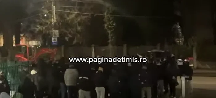 The gendarmes escort the supporters to the front of the hospital. PHOTO: Facebook video capture