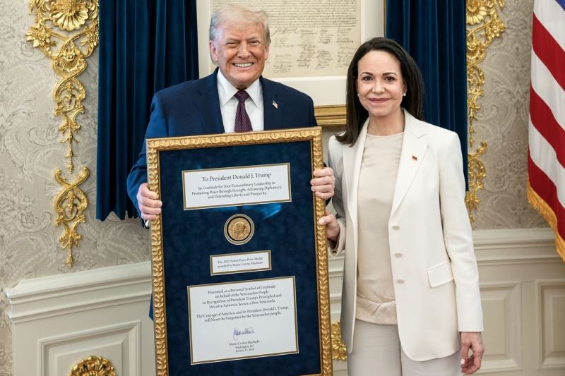Trump accepts Nobel medal from Machado: