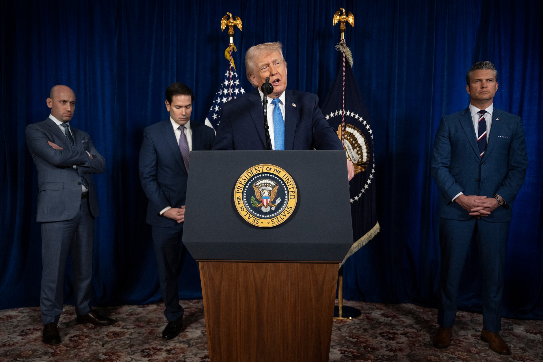 U.S. President Donald Trump with (from left) White House deputy chief of staff Stephen Miller, Secretary of State Marco Rubio and U.S. Secretary of Defense Pete Hegseth during a conference at the Mar-a-Lago residence in Palm Beach, Florida, January 3, 2026.