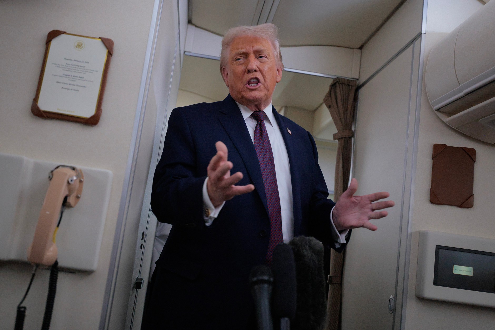 US President Donald Trump returns from Davos, January 22, 2026.