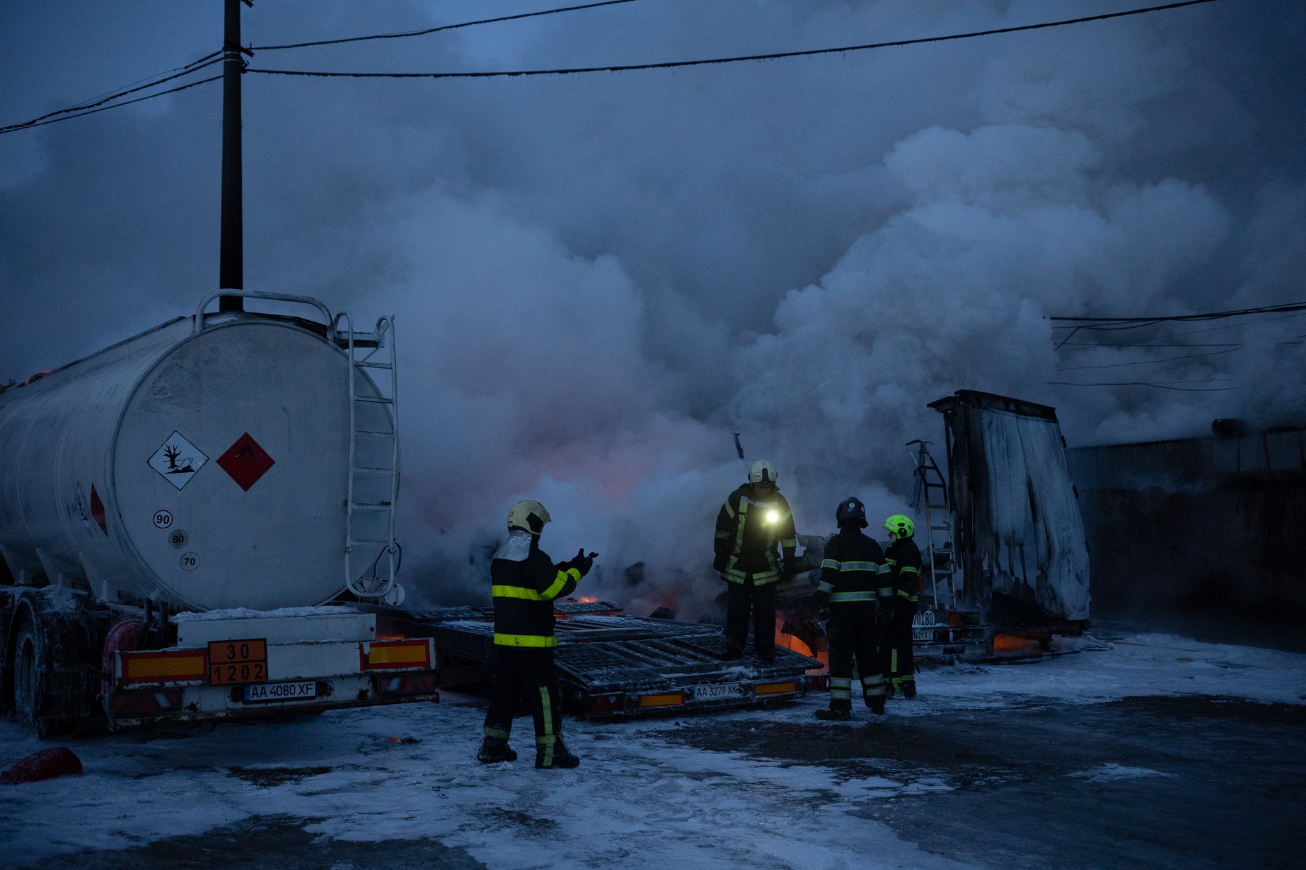 Ukrainian rescue services extinguishing a fire at the site of a Russian airstrike, Kiev, Ukraine, January 24, 2026.