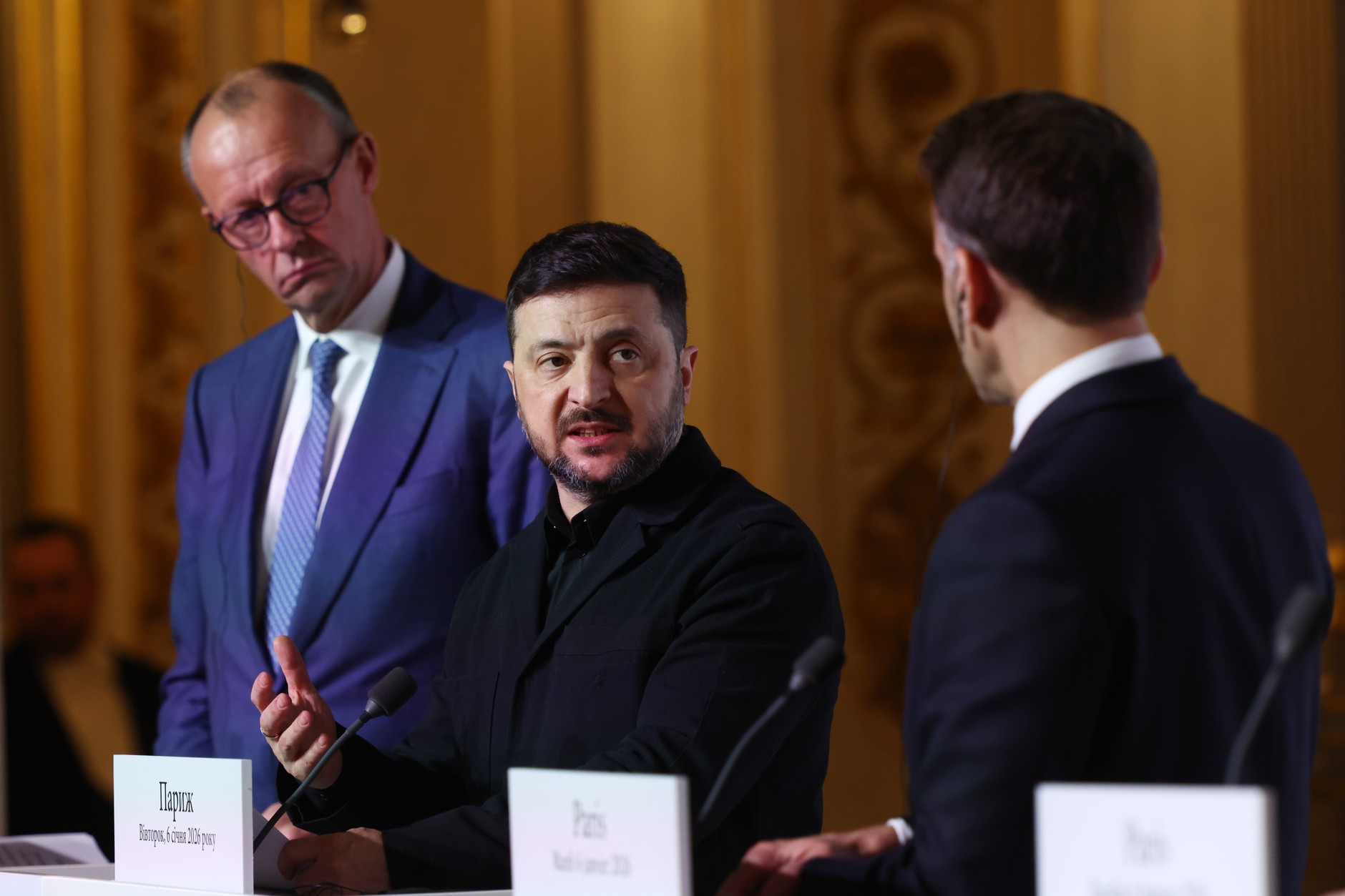 German Chancellor Friedrich Merz, Ukrainian President Volodymyr Zelensky and French President Emmanuel Macron attend a press conference during the Coalition of the Willing meeting in Paris, January 6, 2026.