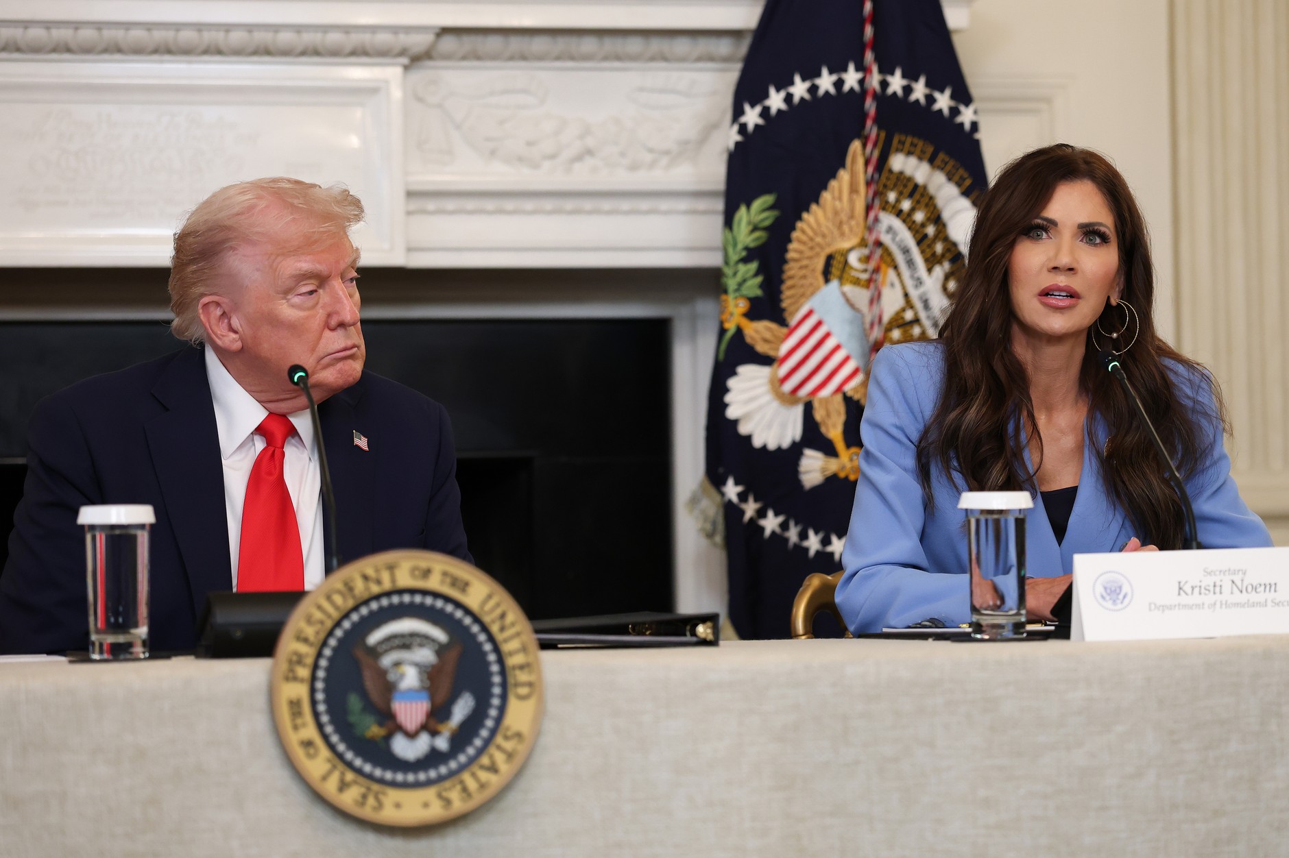 Kristi Noem and Donald Trump in the White House banquet hall, October 8, 2025.