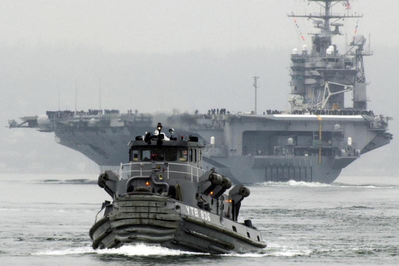 Accompanied by warships, USS Abraham Lincoln aircraft carrier arrived in the Middle East
