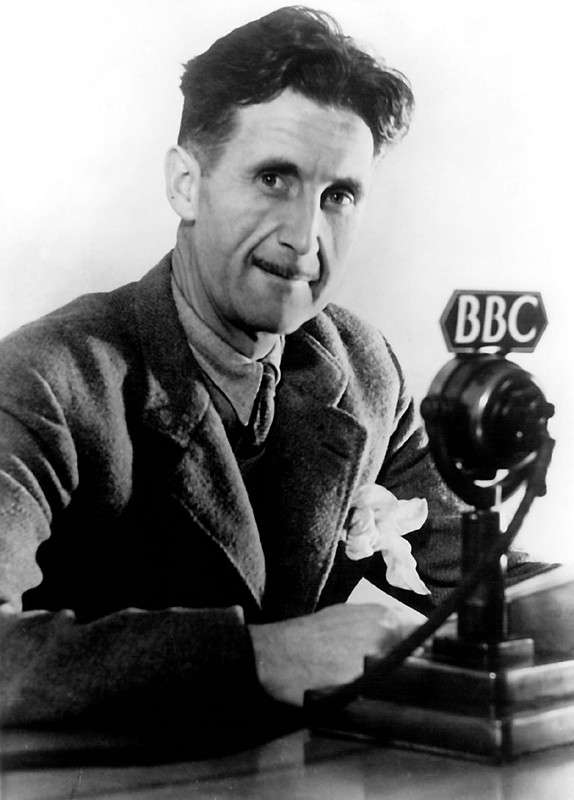George Orwell in front of a BBC microphone