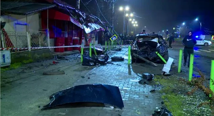The car landed on the roof of the store. PHOTO: ProTv video capture