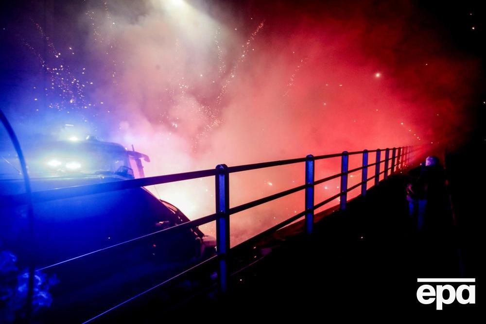 Throwing fireworks and clashes with police. Mass protests against the Olympic Games took place in Milan. Photo 1