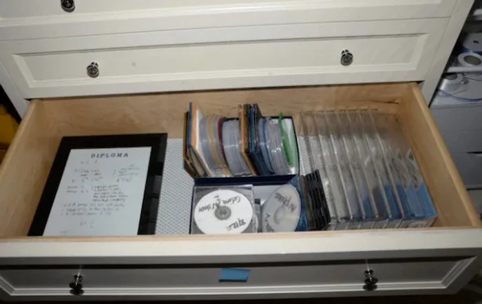 In Epstein's closet in Palm Beach were CDs. Source: Department of Justice