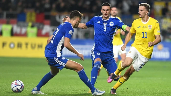 Bancu, right, at a match with Bosnia, is carefully analyzed by the Turks PHOTO EPA