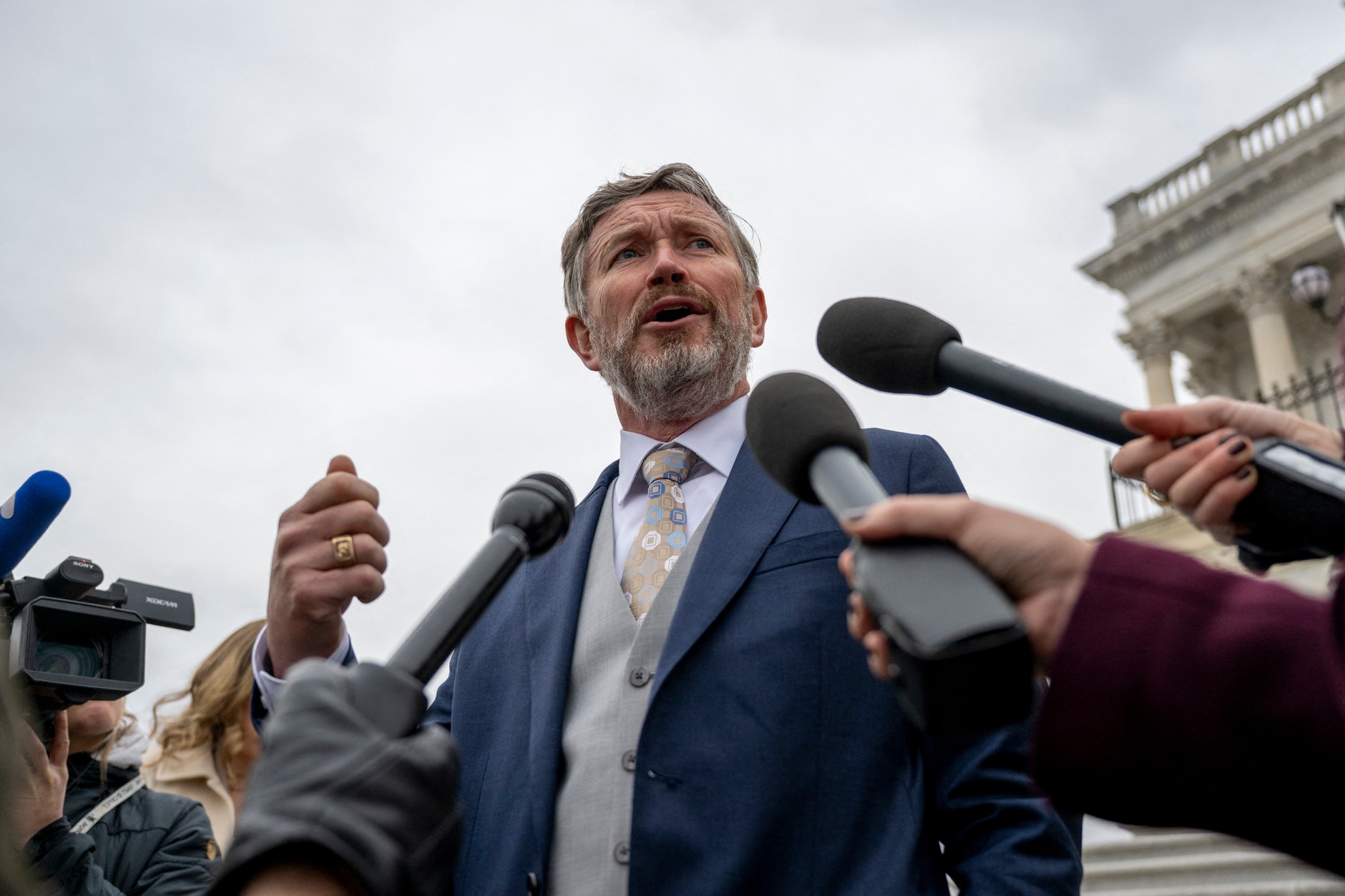 Thomas Massie, Republican from Kentucky, speaks to reporters outside the Capitol, Washington, U.S., November 18, 2025.